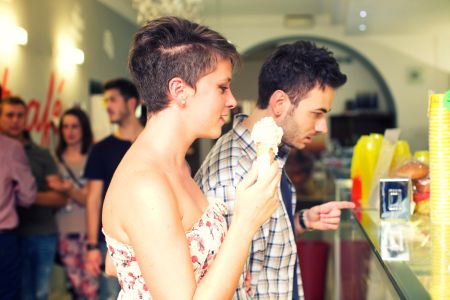 Couple buy an ice cream cone