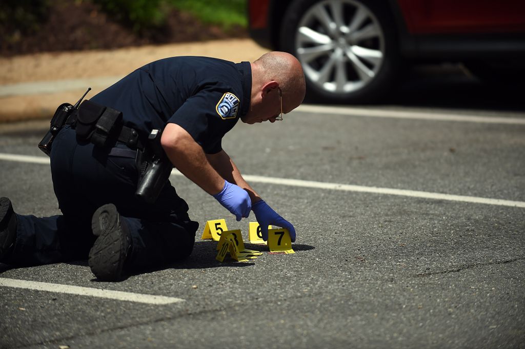 ARLINGTON, VA - May 18: Crime scene marker are placed near an a