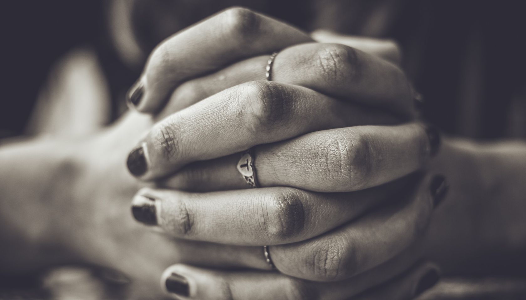 Close-Up Of Clasped Hands