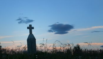 Cross Shaped Tombstone at sunset