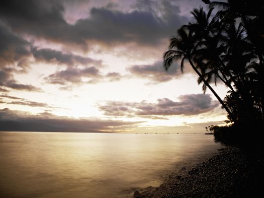 Sunset over ocean and tropical beach