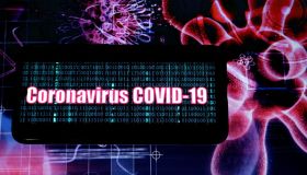 In this photo illustration a Corona Virus (Covid 2019) logo...
