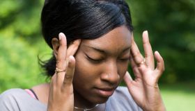 Woman Stressed with Headache