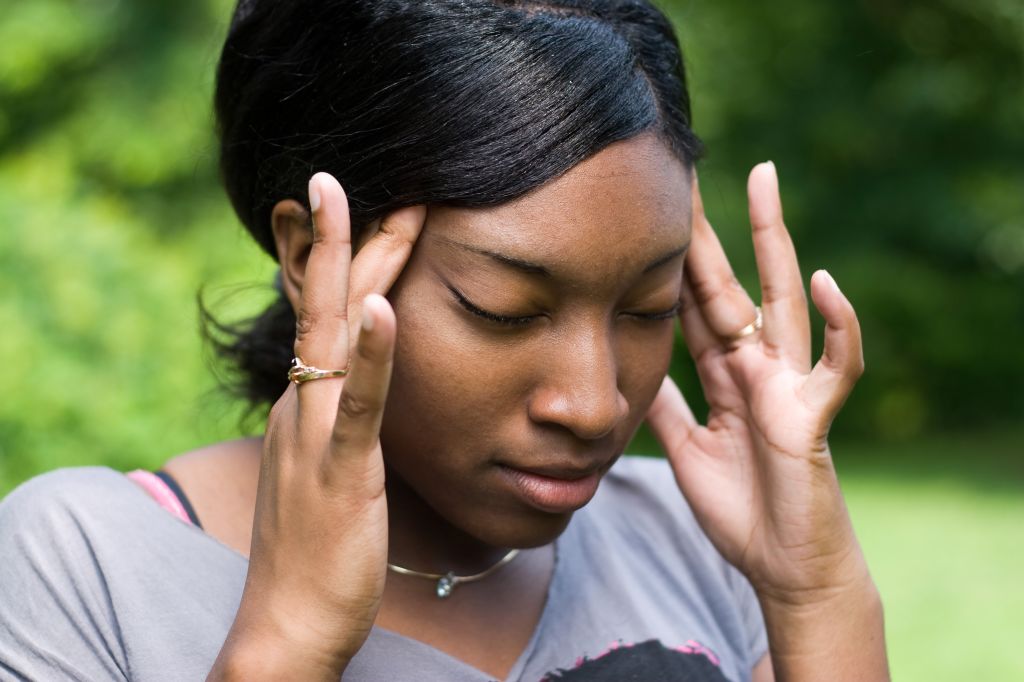 Woman Stressed with Headache