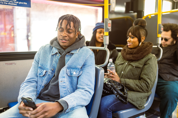 Afternoon Public Transit: Commuters on Bus