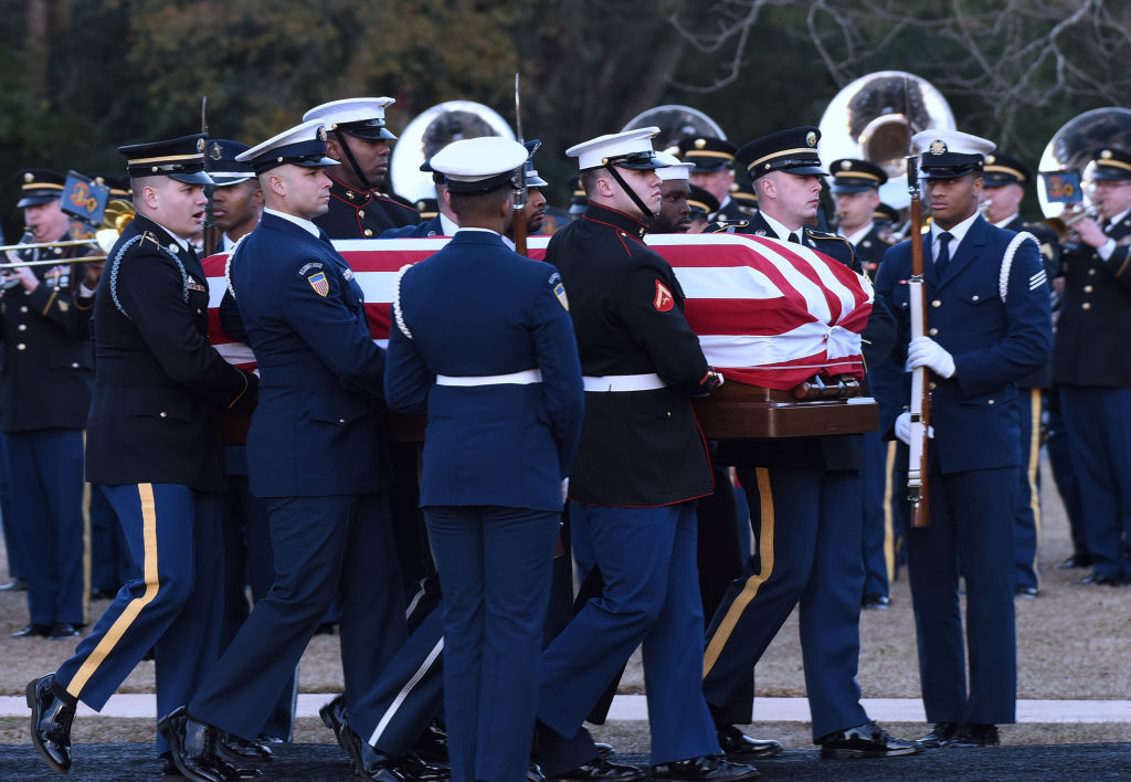 Casket of former US President Jimmy Carter returns to Georgia for private funeral