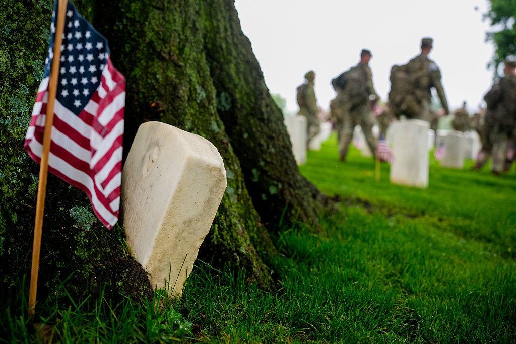 Flags In Takes Place At Arlington National Cemetery Ahead Of Memorial Day